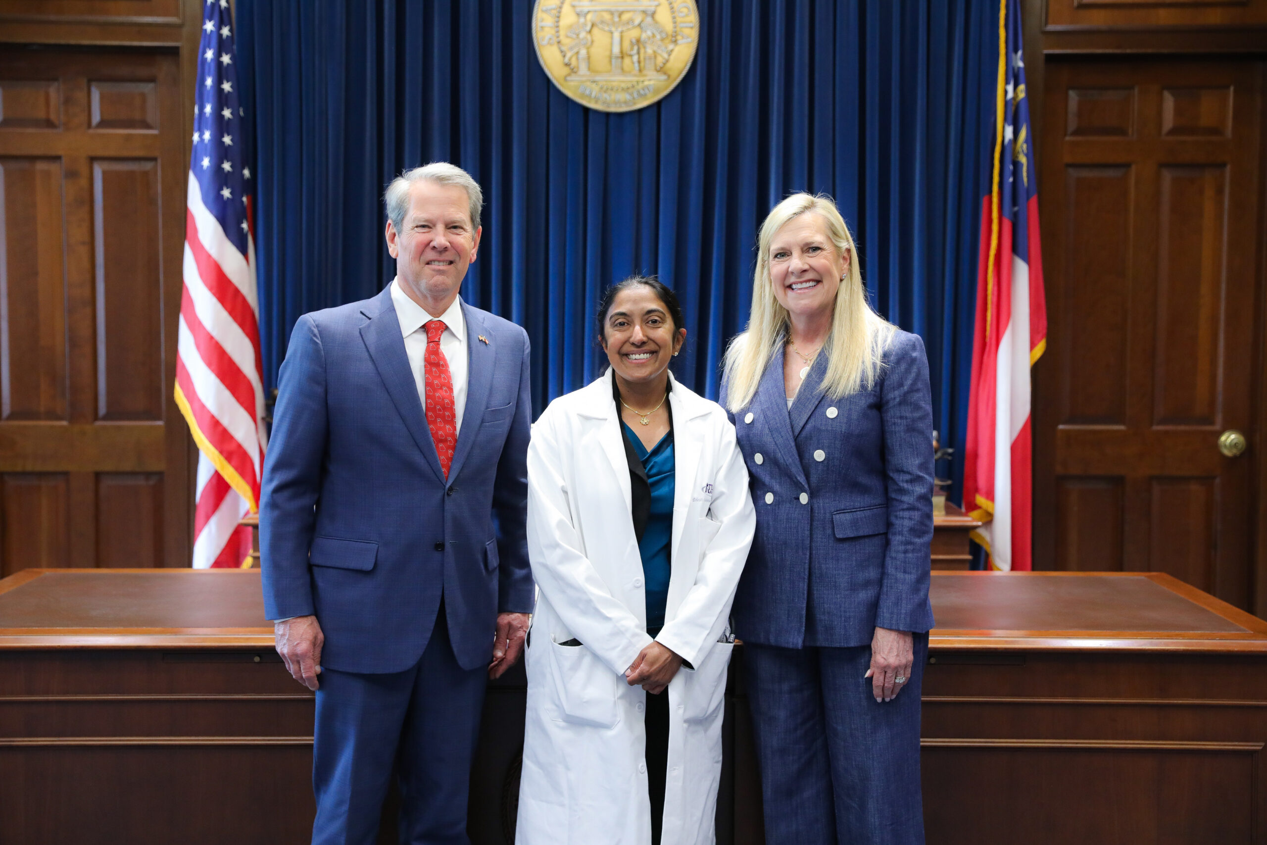 Dr. Dhruti Contractor with Governor Brian Kemp and First Lady Marty Kemp at the Georgia State Capitol