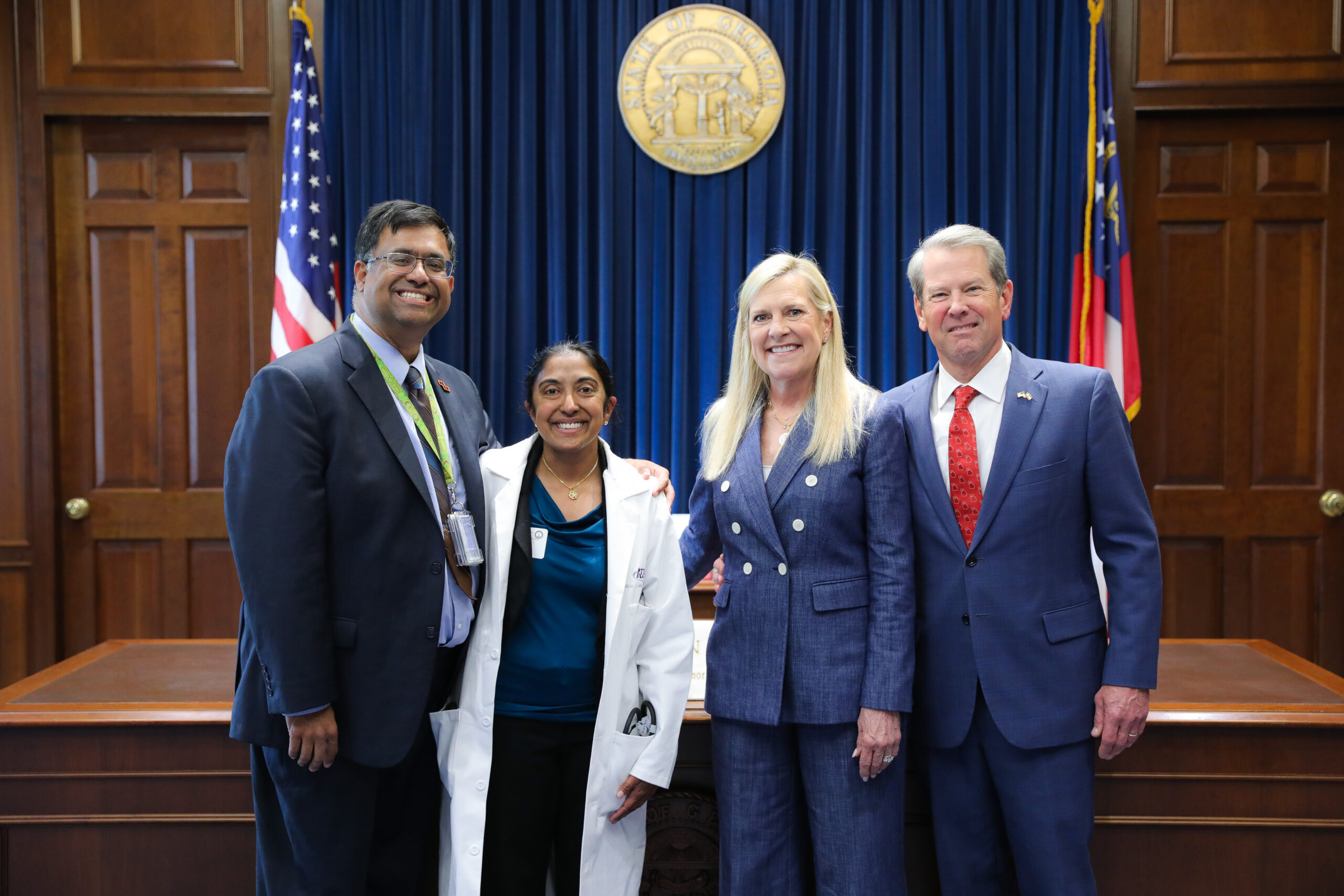 Dr. Dhruti Contractor with her husband Rahul Bali, Governor Brian Kemp and First Lady Marty Kemp at the Georgia State Capitol