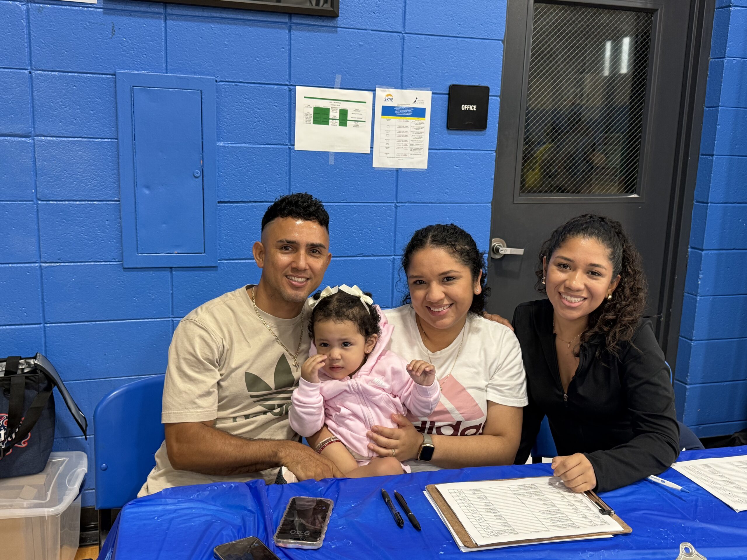 AHS staff and families at the Happy Kids Tournaments registration table